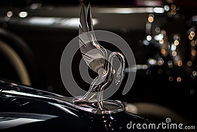 Swan emblem on a vintage car of Packard company Editorial Stock Photo