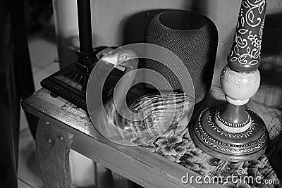Swan figure and a modern speaker in the background, the concept of a modern and vintage merging Stock Photo