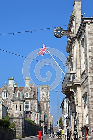 The town hall on the right side and Victorian building Purbeck House Hotel on the left side on High Street, Isle of Purbeck, D Editorial Stock Photo