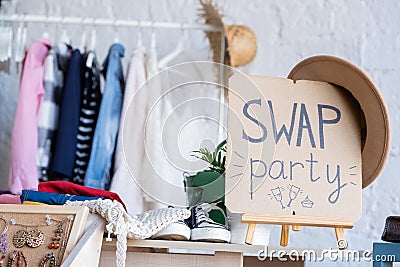 Swap party. Event for exchange of clothes, shoes, accessories. Reduce and reuse Stock Photo