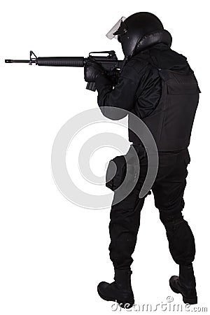 SWAT officer with assault rifle in black uniform Stock Photo
