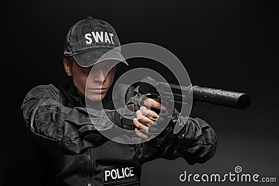 SWAT police officer with pistol Stock Photo