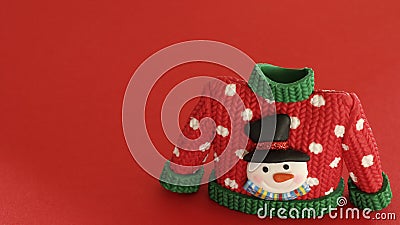 Red sweater with green collar and sleeve cuffs Stock Photo