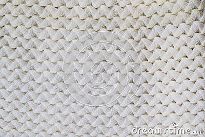 Sweater or scarf Pattern Of White Knitted Fabric Texture Background Stock Photo