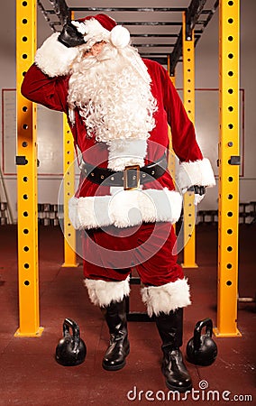 Sweating, tired Santa Claus Stock Photo