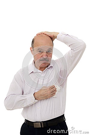 Sweaty spot on the shirt because of the heat, worries and diffidence. Stock Photo