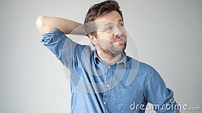 Sweaty spot on the shirt because of the heat, worries and diffidence Stock Photo