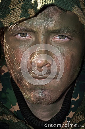 Sweden, Berget 27 Jun 2012: Army airsoft man young soldier with military style clothing and face paint make-up Editorial Stock Photo