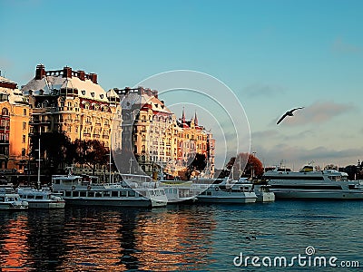 Sweden - Winter Stockholm view to ships from water at sunset Editorial Stock Photo