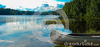 Swedish lake with canoe Stock Photo