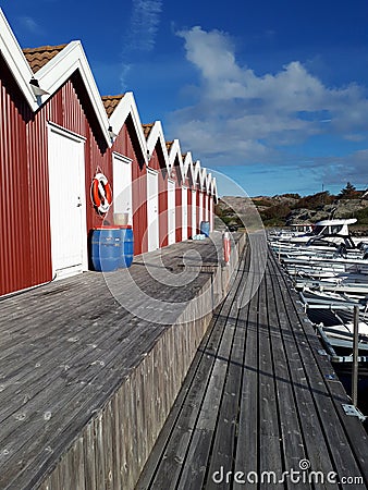 Swedish red wooden boat huts Stock Photo