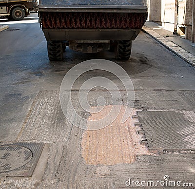 Sweeper attachments mini excavator. Stock Photo