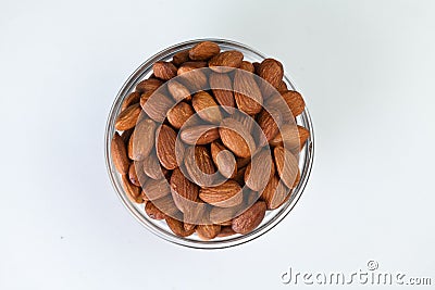 Sweet almond dried fruit snack bowl on white background Stock Photo