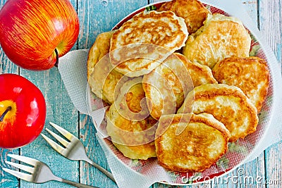 Sweet apple pancakes on plate Stock Photo