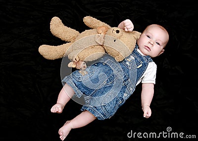 Sweet baby boy with cuddly toy Stock Photo