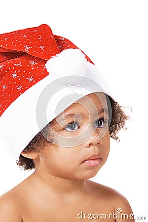 Sweet baby in Christmas hat Stock Photo