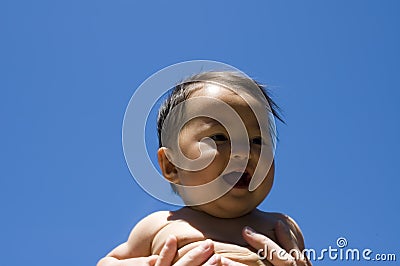 Sweet baby girl in the air Stock Photo