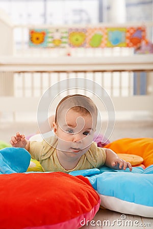 Sweet baby on playmat Stock Photo