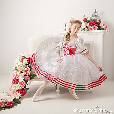 Sweet ballerina straightens her skirt Stock Photo