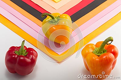 Sweet bell pepper on a colored background. Studio light. Top vie Stock Photo