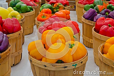 Sweet Bell Peppers in baskets Stock Photo