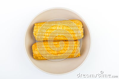 Sweet boiled corn on a white plate Stock Photo