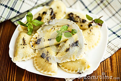 Sweet boiled dumplings with poppy Stock Photo