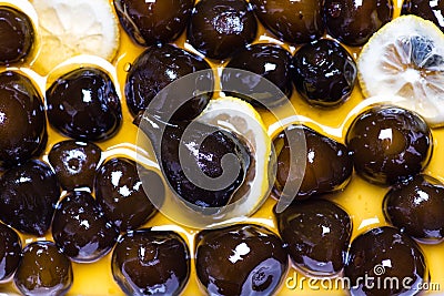 Sweet boiled figs with lemon background Stock Photo