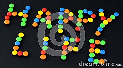Sweet bonbons with HAPPY LIFE title Stock Photo
