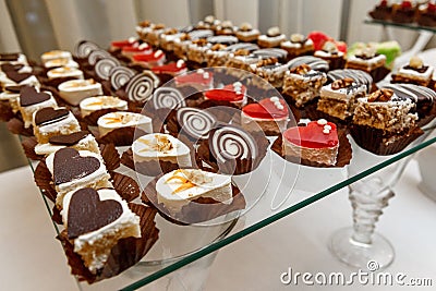 Sweet buffet - chocolate cakes, souffle and Swiss rolls, catering Stock Photo