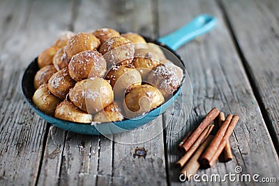 Sweet cinnamon buns, bread snack in a pan, dessert Stock Photo