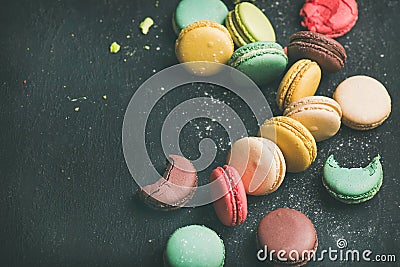 Sweet colorful French macaroon cookies variety with sugar powder Stock Photo