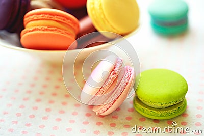 Sweet and colourful french macaroons on retro-vintage Stock Photo