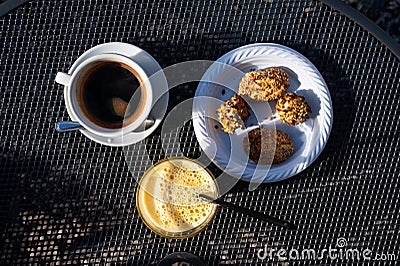 Sweet cookies with nuts and an espresso, Monreale, Italy Stock Photo