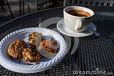 Sweet cookies with nuts and an espresso, Monreale, Italy Stock Photo