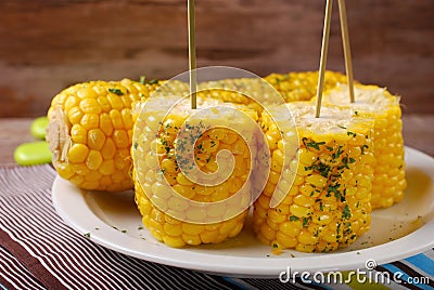 Sweet corn with butter and herbs Stock Photo