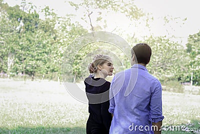 Sweet couple relaxing in park young beautiful lover walking and spending time together and having romantic moment in summer Stock Photo