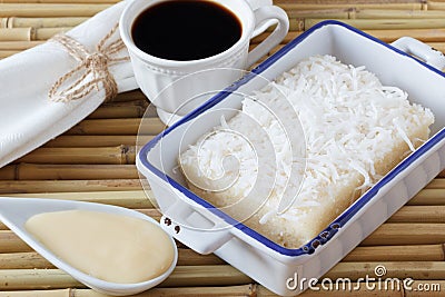 Sweet couscous (tapioca) pudding (cuscuz doce) with coconut, cup Stock Photo