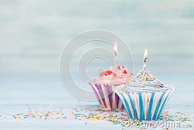 Sweet cupcakes with candles Stock Photo