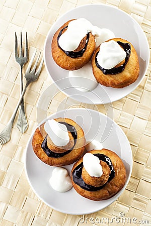 Beignets with chocolate and cream Stock Photo