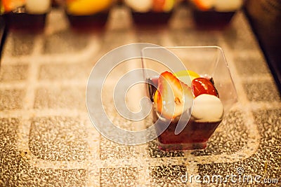 Sweet Dessert: Selective focused Colorful Delicious Fruit Jelly on the black and white stone table background for food and drink Stock Photo