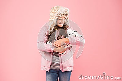 Sweet dreams. pet care concept. little child warm puffer jacket. fashionable kid earflap hat. winter fashion. childhood Stock Photo