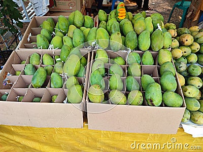 Sweet fragrant mango fruit sold in the market Stock Photo