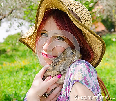 Sweet girl with baby bunny Stock Photo