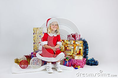 Sweet girl in a red Christmas costume Stock Photo