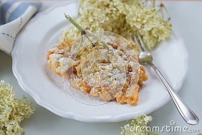 Sweet home made fried elderflowers in pancake Stock Photo