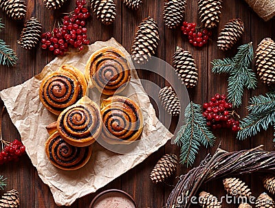 Sweet Homemade christmas baking. Cinnamon rolls buns with cocoa filling. Kanelbulle swedish dessert. Top view. Stock Photo