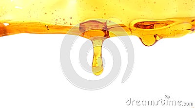 Sweet honeycomb and wooden dipper with dripping honey isolated on white background. Stock Photo