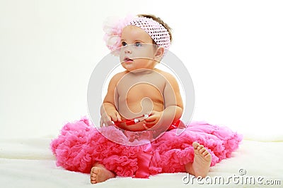 Sweet infant wearing a pink tutu Stock Photo