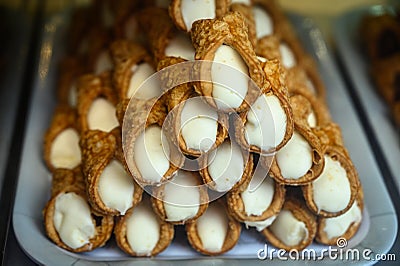 Sweet italian desssert, pile of cannoli pastry filled with ricotta cream cheese Stock Photo
